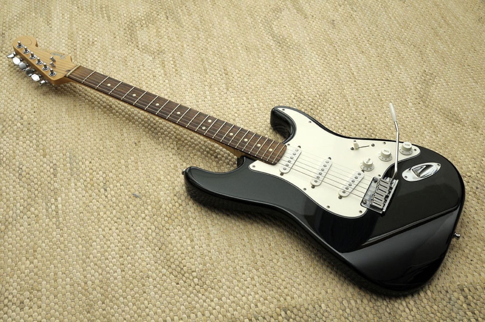 Built in strap locks? Fender Stratocaster Guitar Forum