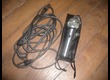 Micro Shure avec sa housse et son cable.