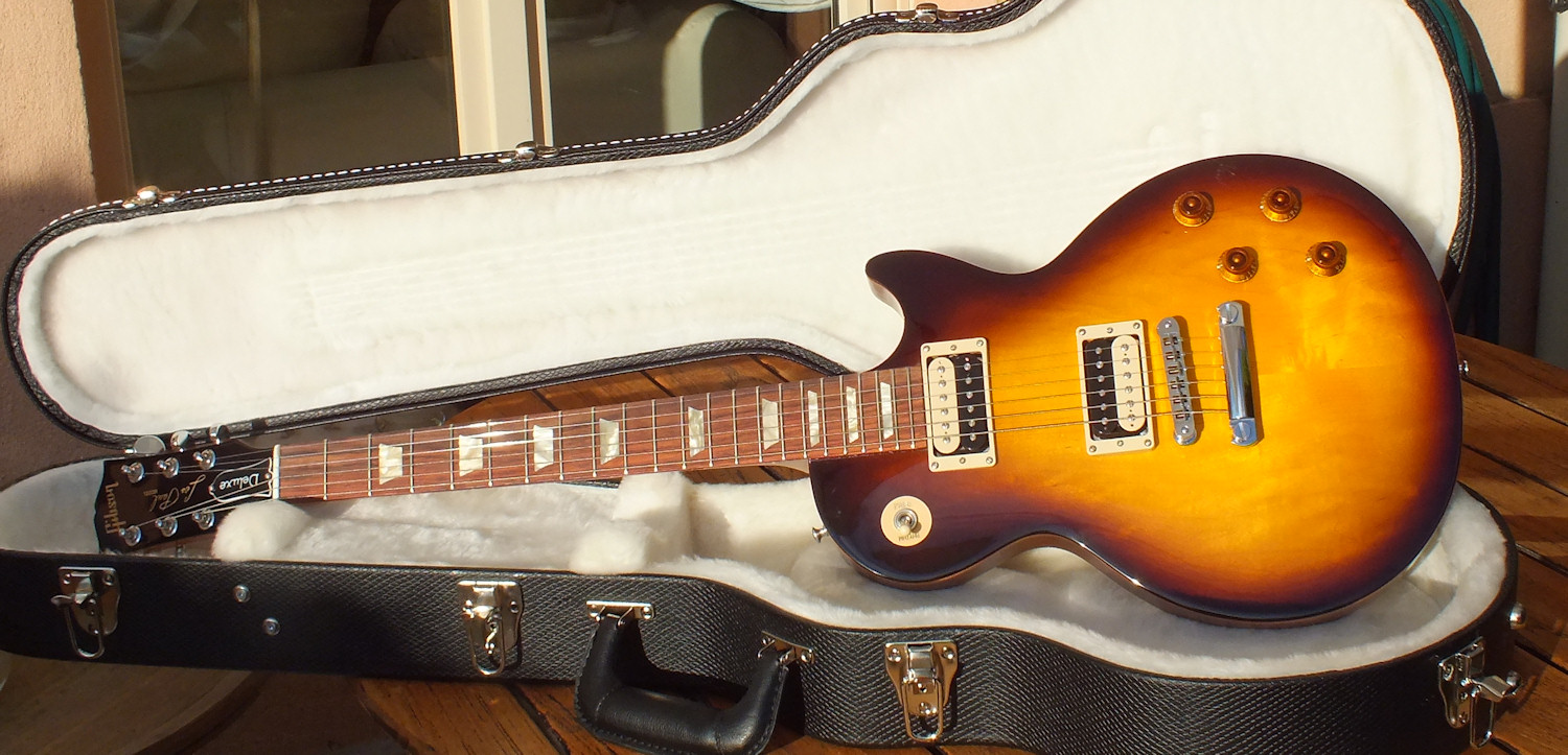 Photo Gibson Les Paul Studio Deluxe ’60s Exclusive Vintage Sunburst Gibson USA Les Paul