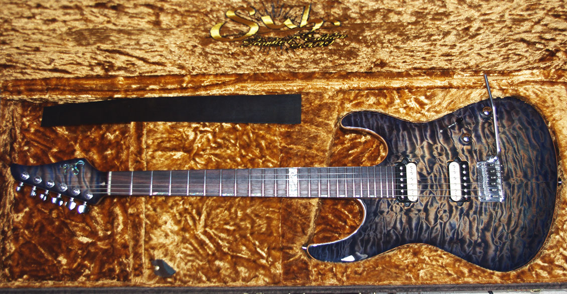 suhr-modern-2009-carve-top-le-844609.jpg