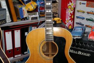 Guild F-50R w/ D-Tar