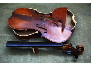 depositphotos 311529842-stock-photo-broken-old-violin-lying-awaiting