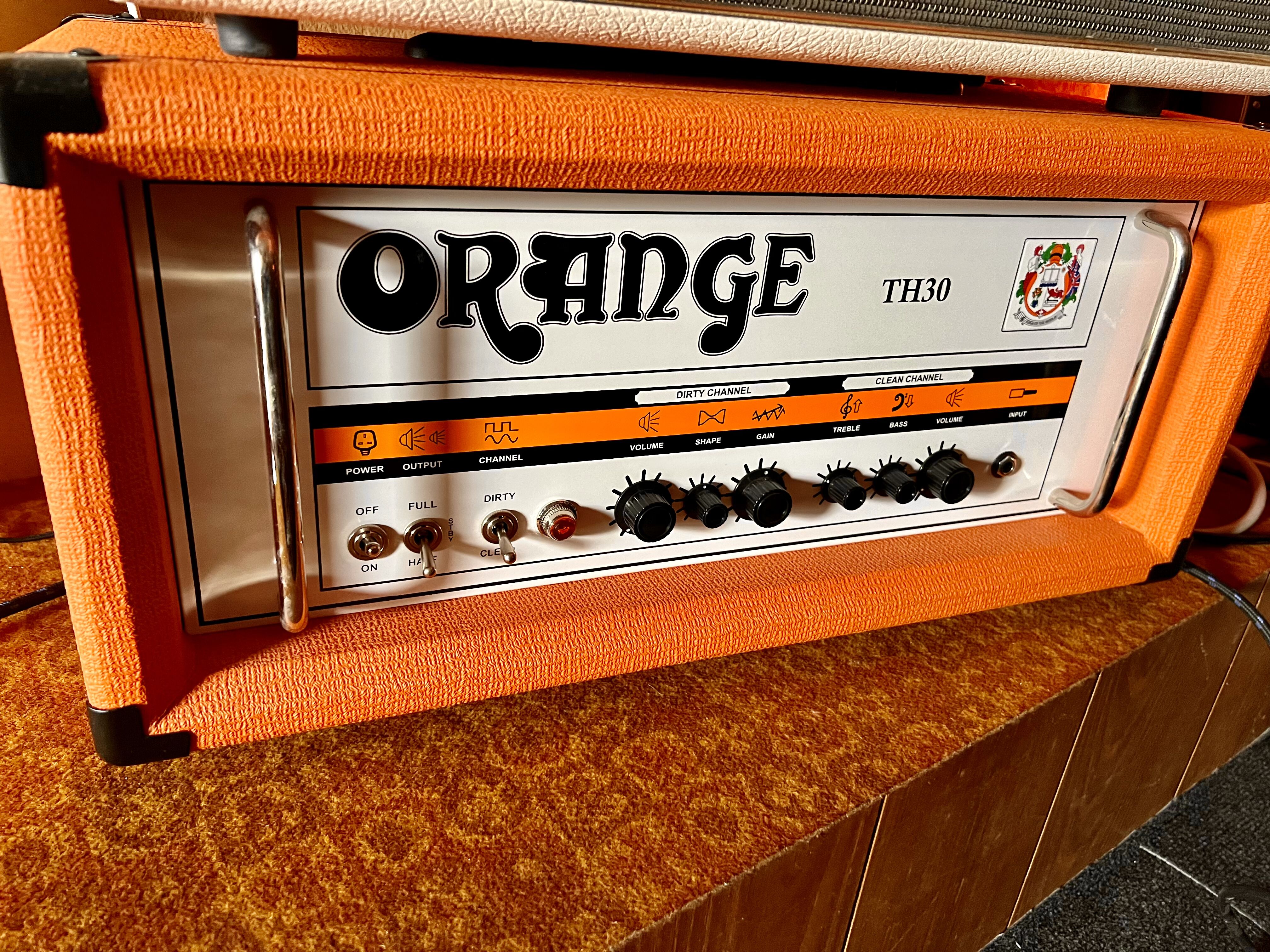 ORANGE TH 3O HEAD COMME NEUVE