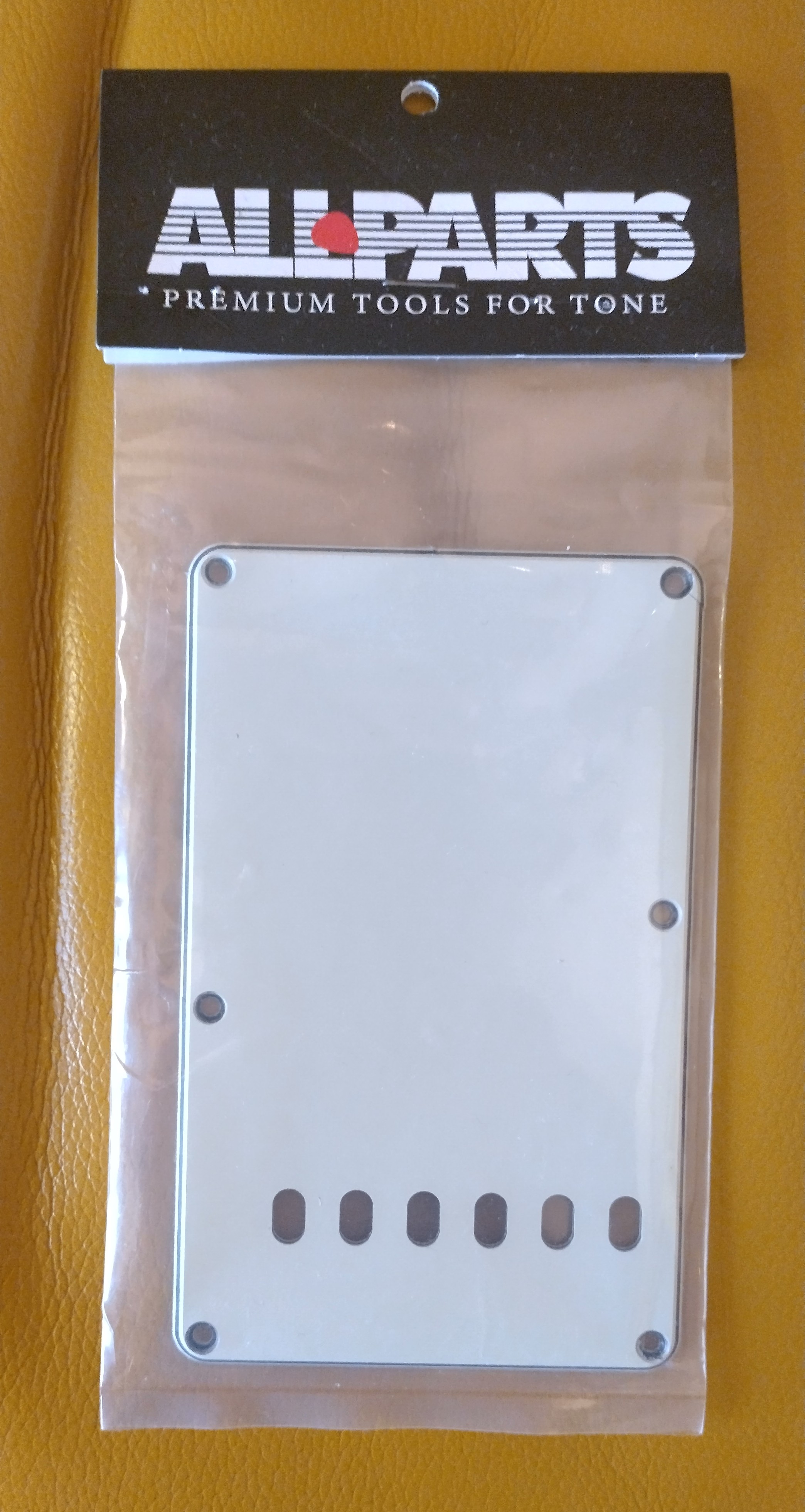 Allparts Stratocaster back plate 3 plis Vintage Mint