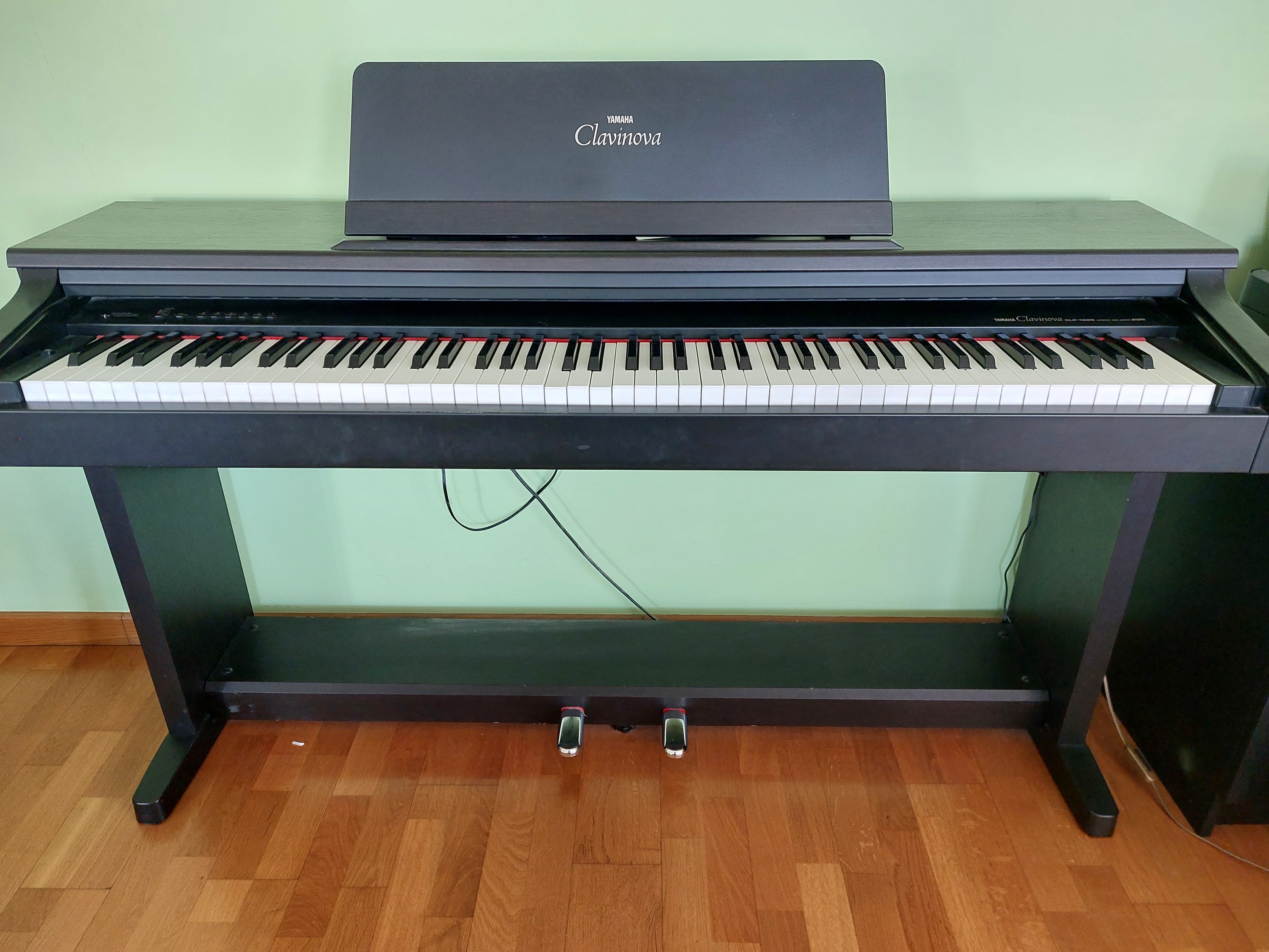 Vend Clavinova 122S en bon état