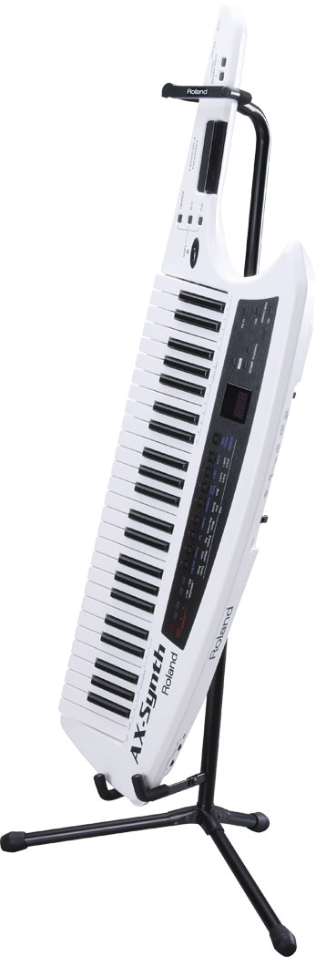 Vends AX SYNTH ROLAND parfait état (avec housse et support).