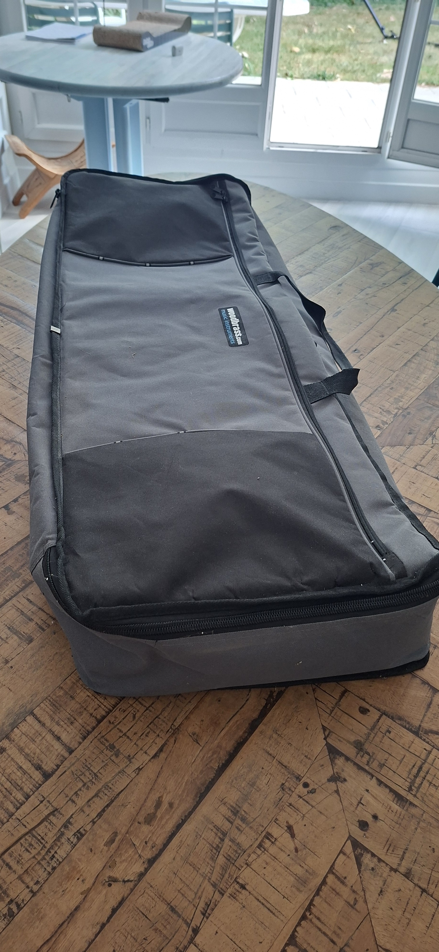 Vends housse clavier Woodbrass avec bretelles
